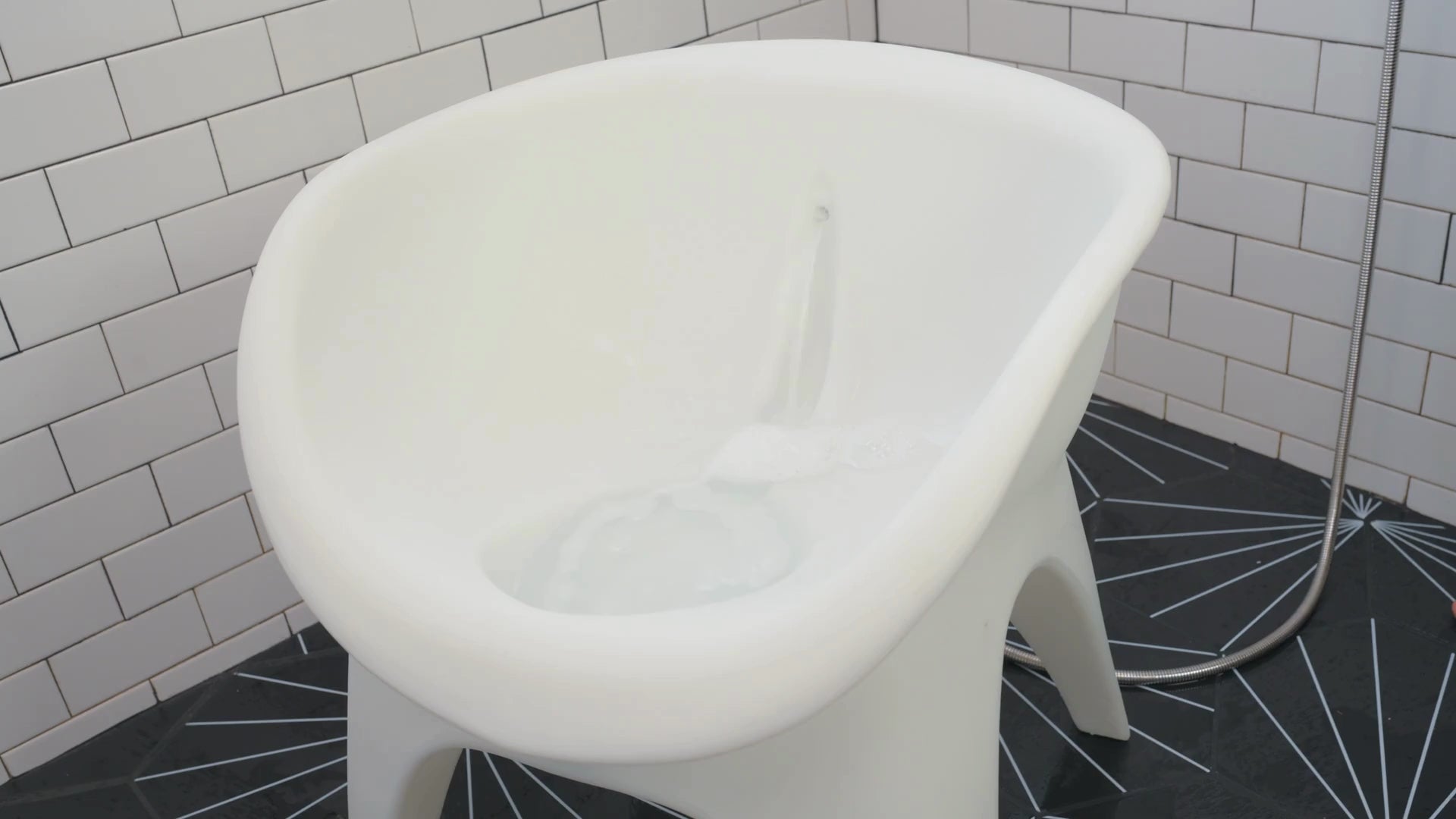 The SoSoak™ Shower Soaking Chair