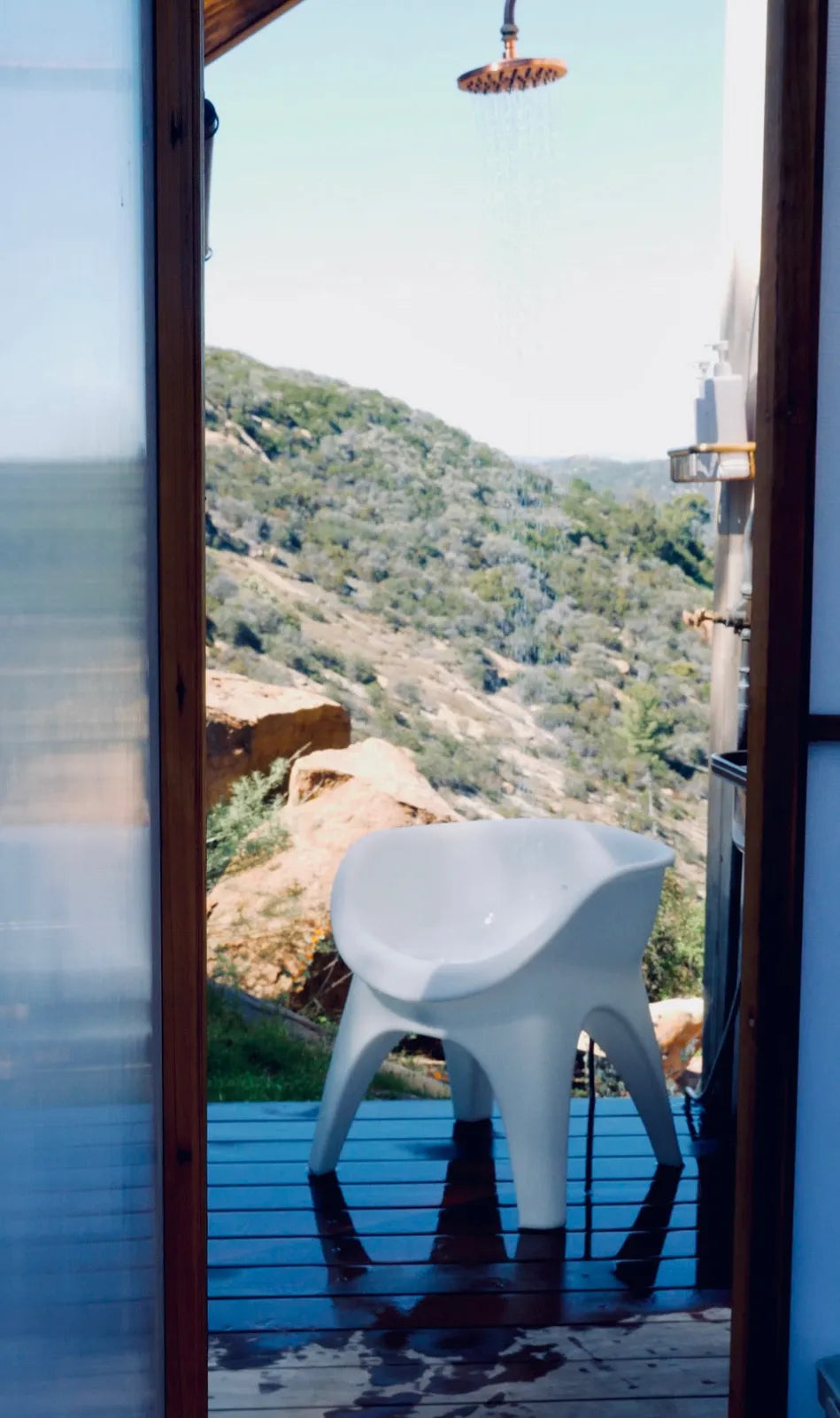 SoSoak chair on a sunny balcony overlooking the hills